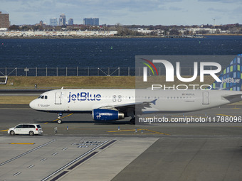 JetBlue Airbus A320-200 passenger aircraft spotted taxiing in LaGuardia airport LGA in New York City. The A320 airplane has the registration...