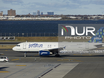 JetBlue Airbus A320-200 passenger aircraft spotted taxiing in LaGuardia airport LGA in New York City. The A320 airplane has the registration...