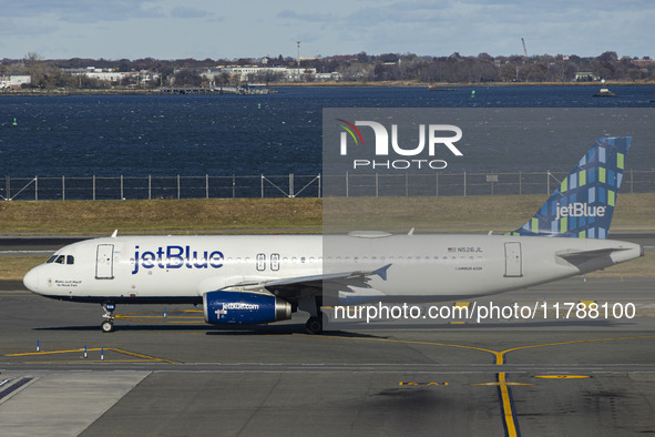 JetBlue Airbus A320-200 passenger aircraft spotted taxiing in LaGuardia airport LGA in New York City. The A320 airplane has the registration...