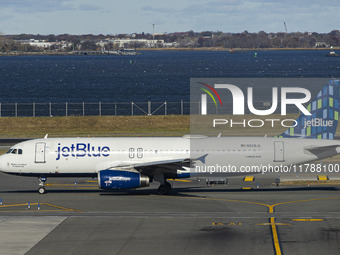 JetBlue Airbus A320-200 passenger aircraft spotted taxiing in LaGuardia airport LGA in New York City. The A320 airplane has the registration...