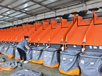 Workers sort parcels at an express logistics company in Qingzhou, China, on November 11, 2024. Monitoring data from the State Post Bureau sh...