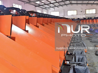 Workers sort parcels at an express logistics company in Qingzhou, China, on November 11, 2024. Monitoring data from the State Post Bureau sh...