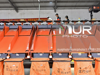 Workers sort parcels at an express logistics company in Qingzhou, China, on November 11, 2024. Monitoring data from the State Post Bureau sh...