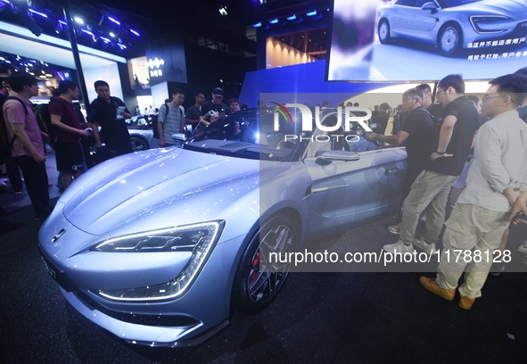 Visitors look at the newly released YANGWANG U7 luxury sedan at the Guangzhou Auto Show in Guangzhou, China, on November 15, 2024. 