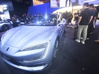 Visitors look at the newly released YANGWANG U7 luxury sedan at the Guangzhou Auto Show in Guangzhou, China, on November 15, 2024. (