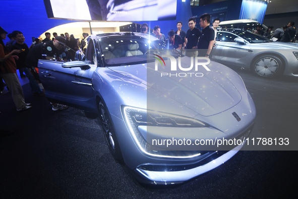 Visitors look at the newly released YANGWANG U7 luxury sedan at the Guangzhou Auto Show in Guangzhou, China, on November 15, 2024. 