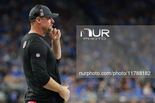 DETROIT,MICHIGAN-November 17: Detroit Lions head coach Dan Campbell looks on during the second half of an NFL football game between the Jack...