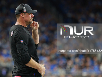 DETROIT,MICHIGAN-November 17: Detroit Lions head coach Dan Campbell looks on during the second half of an NFL football game between the Jack...