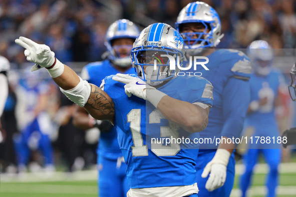 DETROIT,MICHIGAN-November 17: Detroit Lions running back Craig Reynolds (13) reacts after a play during the second half of an NFL football g...