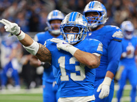 DETROIT,MICHIGAN-November 17: Detroit Lions running back Craig Reynolds (13) reacts after a play during the second half of an NFL football g...