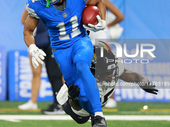 DETROIT,MICHIGAN-November 17: Detroit Lions wide receiver Kalif Raymond (11) runs the ball against Jacksonville Jaguars wide receiver Tim Jo...