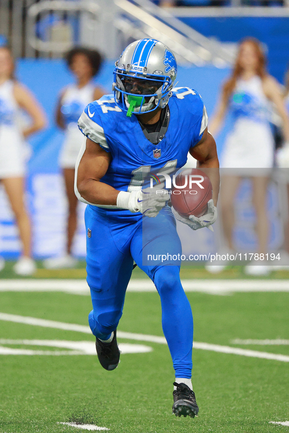 DETROIT,MICHIGAN-November 17: Detroit Lions wide receiver Kalif Raymond (11) runs the ball during the second half of an NFL football game be...