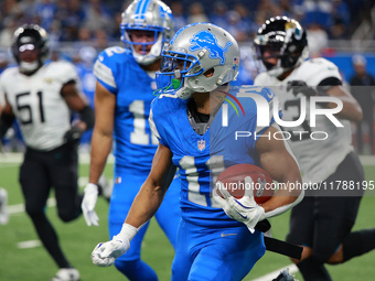 DETROIT,MICHIGAN-November 17: Detroit Lions wide receiver Kalif Raymond (11) runs the ball during the second half of an NFL football game be...