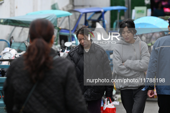 Citizens shop at a farmer's market in Nanjing, China, on November 18, 2024. 