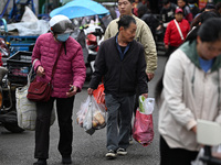 Citizens shop at a farmer's market in Nanjing, China, on November 18, 2024. (