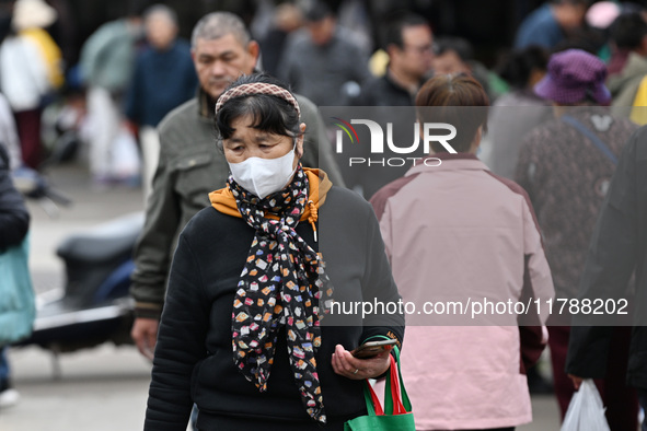 Citizens shop at a farmer's market in Nanjing, China, on November 18, 2024. 