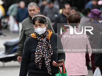 Citizens shop at a farmer's market in Nanjing, China, on November 18, 2024. (