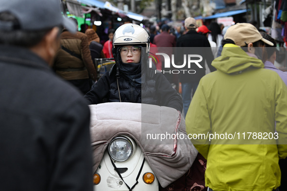 Citizens shop at a farmer's market in Nanjing, China, on November 18, 2024. 