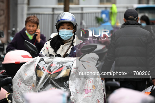 Citizens shop at a farmer's market in Nanjing, China, on November 18, 2024. 