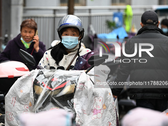 Citizens shop at a farmer's market in Nanjing, China, on November 18, 2024. (