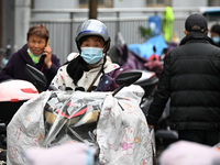 Citizens shop at a farmer's market in Nanjing, China, on November 18, 2024. (