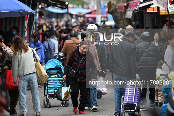 Citizens shop at a farmer's market in Nanjing, China, on November 18, 2024. 