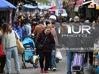 Citizens shop at a farmer's market in Nanjing, China, on November 18, 2024. (