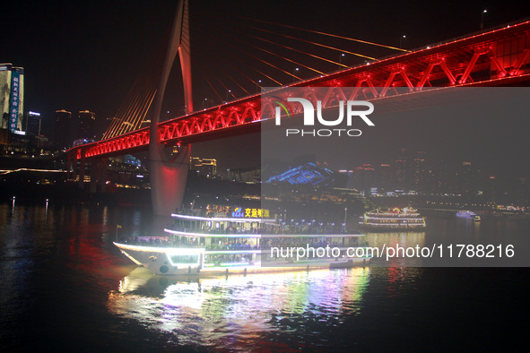 Tourists visit the Hong Ya Dong scenic area in Chongqing, China, on November 7, 2024. 