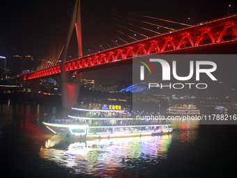 Tourists visit the Hong Ya Dong scenic area in Chongqing, China, on November 7, 2024. (