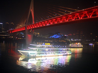 Tourists visit the Hong Ya Dong scenic area in Chongqing, China, on November 7, 2024. (