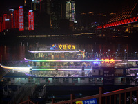 Tourists visit the Hong Ya Dong scenic area in Chongqing, China, on November 7, 2024. (