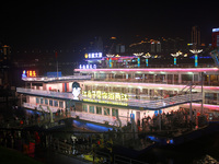 Tourists visit the Hong Ya Dong scenic area in Chongqing, China, on November 7, 2024. (