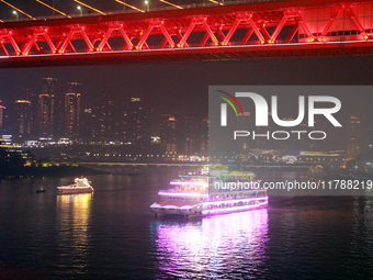 Tourists visit the Hong Ya Dong scenic area in Chongqing, China, on November 7, 2024. (