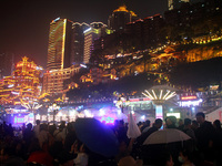 Tourists visit the Hong Ya Dong scenic area in Chongqing, China, on November 7, 2024. (