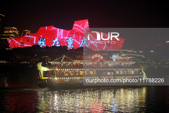 Tourists visit the Hong Ya Dong scenic area in Chongqing, China, on November 7, 2024. 