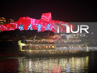 Tourists visit the Hong Ya Dong scenic area in Chongqing, China, on November 7, 2024. (