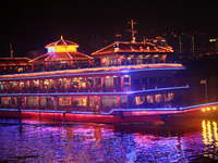 Tourists visit the Hong Ya Dong scenic area in Chongqing, China, on November 7, 2024. (