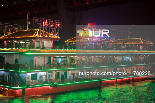 Tourists visit the Hong Ya Dong scenic area in Chongqing, China, on November 7, 2024. 