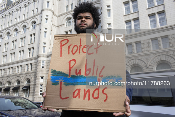 Environmental activists rally to demand climate action before US President-elect Donald Trump takes office in Washington, DC, on November 17...