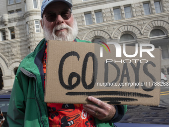 Environmental activists rally to demand climate action before US President-elect Donald Trump takes office in Washington, DC, on November 17...