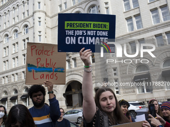 Environmental activists rally to demand climate action before US President-elect Donald Trump takes office in Washington, DC, on November 17...