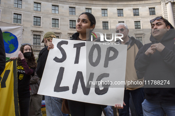 Environmental activists rally to demand climate action before US President-elect Donald Trump takes office in Washington, DC, on November 17...