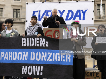 Environmental activists demonstrate outside the Federal Triangle Metro Station in Washington DC, USA, on November 17, 2024. The rally demand...