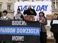 Environmental activists demonstrate outside the Federal Triangle Metro Station in Washington DC, USA, on November 17, 2024. The rally demand...