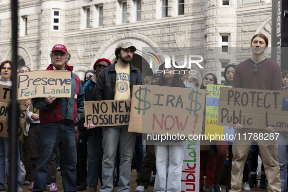 Environmental activists demonstrate outside the Federal Triangle Metro Station in Washington DC, USA, on November 17, 2024. The rally demand...