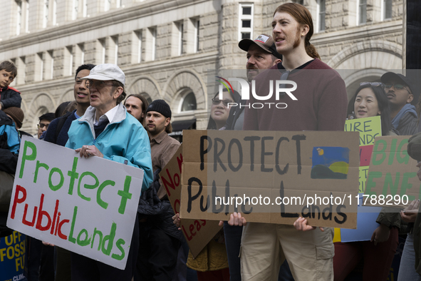 Environmental activists demonstrate outside the Federal Triangle Metro Station in Washington DC, USA, on November 17, 2024. The rally demand...