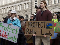 Environmental activists demonstrate outside the Federal Triangle Metro Station in Washington DC, USA, on November 17, 2024. The rally demand...