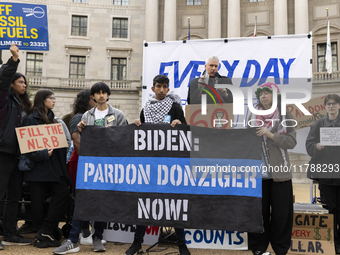 Environmental activists demonstrate outside the Federal Triangle Metro Station in Washington DC, USA, on November 17, 2024. The rally demand...