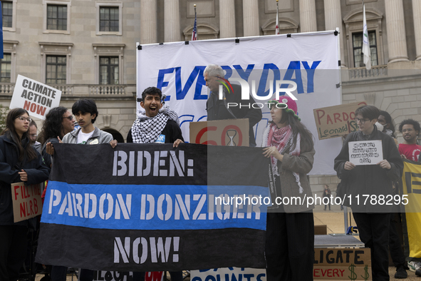 Environmental activists demonstrate outside the Federal Triangle Metro Station in Washington DC, USA, on November 17, 2024. The rally demand...