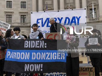 Environmental activists demonstrate outside the Federal Triangle Metro Station in Washington DC, USA, on November 17, 2024. The rally demand...